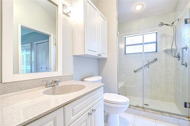 512 Pinewalk Dr, Brandon, FL 33510 - full bathroom with vanity, a stall shower, and tile patterned flooring