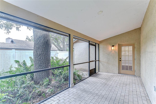 512 Pinewalk Dr, Brandon, FL 33510 - unfurnished sunroom featuring lofted ceiling