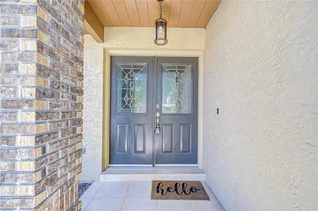 512 Pinewalk Dr, Brandon, FL 33510 - doorway to property with stucco siding