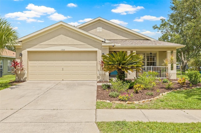 11830 Autumn Creek Dr, Riverview, FL 33569 - ranch-style home featuring stucco siding, a garage, covered porch, and concrete driveway