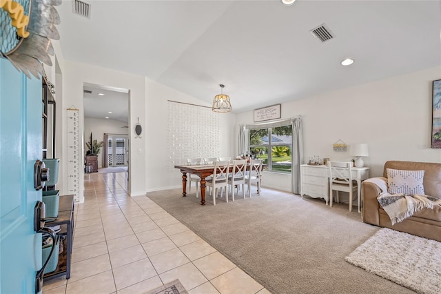 11830 Autumn Creek Dr, Riverview, FL 33569 - dining space featuring light tile patterned flooring, light carpet, lofted ceiling, and recessed lighting