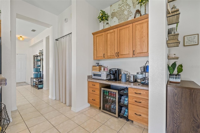 11830 Autumn Creek Dr, Riverview, FL 33569 - bar area with wine cooler and light tile patterned flooring