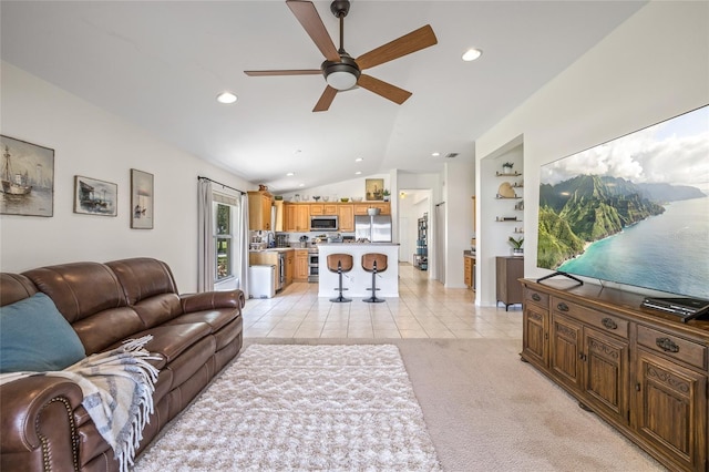11830 Autumn Creek Dr, Riverview, FL 33569 - living area with ceiling fan, lofted ceiling, light tile patterned floors, recessed lighting, and light colored carpet