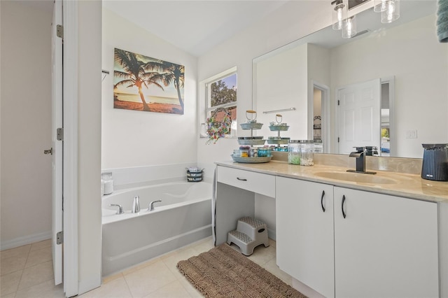 11830 Autumn Creek Dr, Riverview, FL 33569 - bathroom with vanity, a garden tub, tile patterned flooring, and lofted ceiling