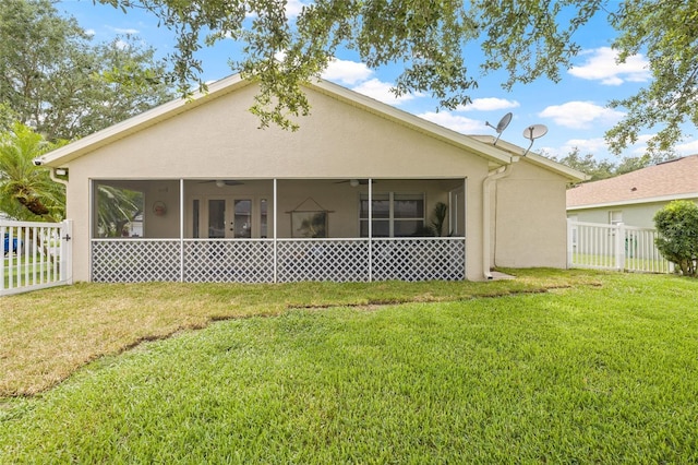 11830 Autumn Creek Dr, Riverview, FL 33569 - rear view of property with stucco siding, a sunroom, and ceiling fan