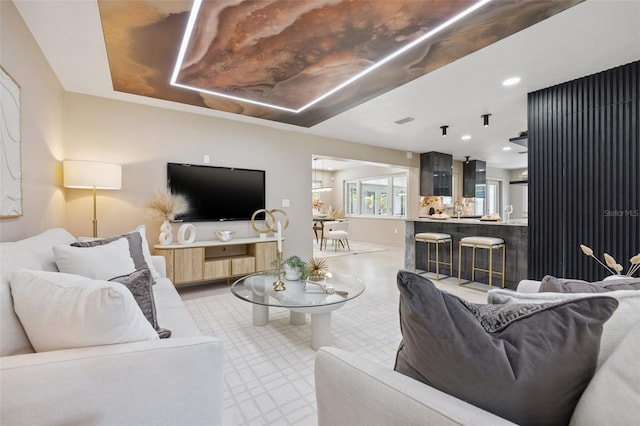 3197 Walnut St NE, Saint Petersburg, FL 33704 - living room featuring tile patterned floors and recessed lighting