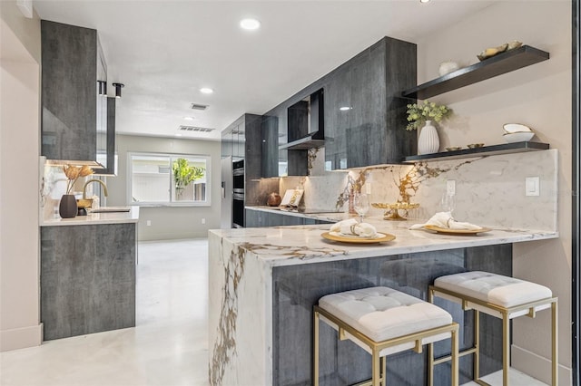 3197 Walnut St NE, Saint Petersburg, FL 33704 - kitchen featuring open shelves, decorative backsplash, recessed lighting, double oven, and extractor fan