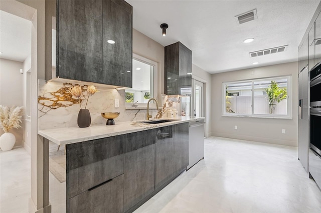 3197 Walnut St NE, Saint Petersburg, FL 33704 - kitchen with stainless steel dishwasher, modern cabinets, and healthy amount of natural light