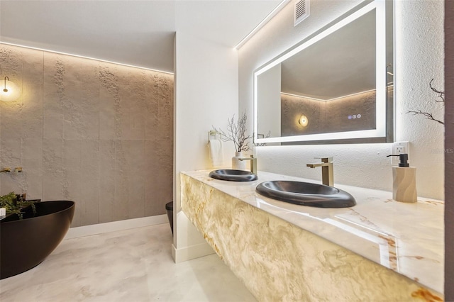 3197 Walnut St NE, Saint Petersburg, FL 33704 - bathroom with concrete floors and double vanity