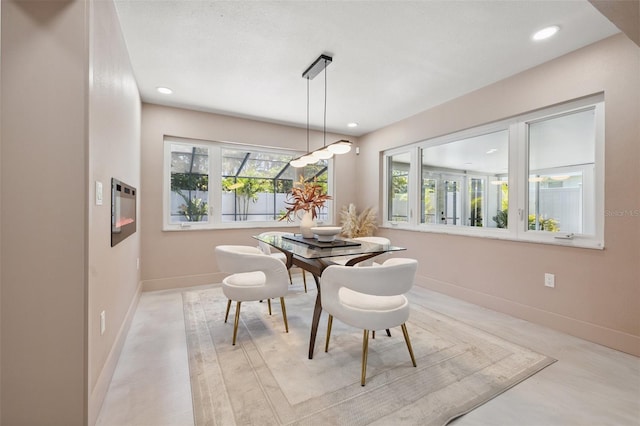 3197 Walnut St NE, Saint Petersburg, FL 33704 - dining room with baseboards and recessed lighting