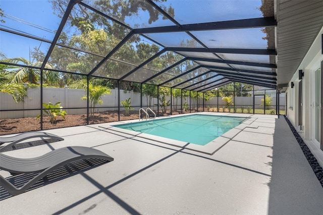 3197 Walnut St NE, Saint Petersburg, FL 33704 - view of pool featuring a fenced backyard, a patio area, and a lanai