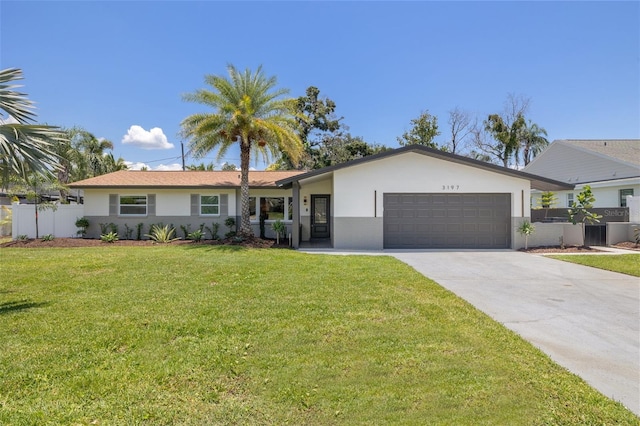 3197 Walnut St NE, Saint Petersburg, FL 33704 - ranch-style home featuring an attached garage, driveway, and stucco siding