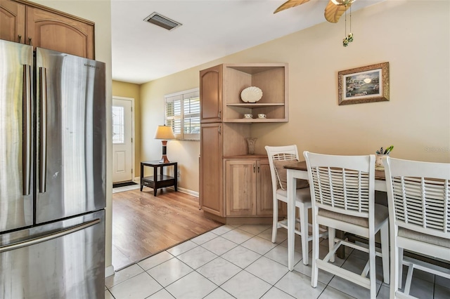 12400 Park Blvd Unit 519, Seminole, FL 33772 - dining room featuring a ceiling fan and light tile patterned floors