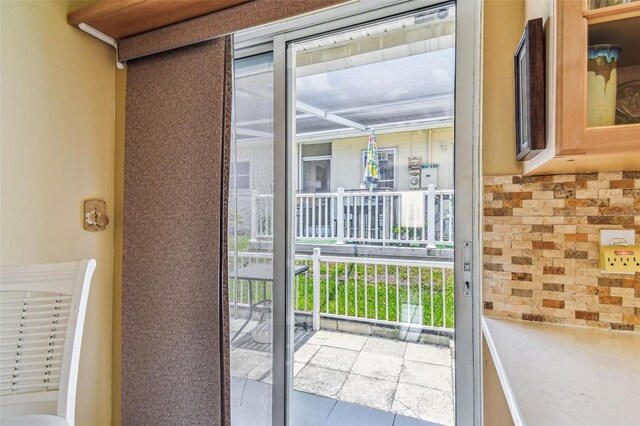12400 Park Blvd Unit 519, Seminole, FL 33772 - doorway to outside with tile patterned flooring