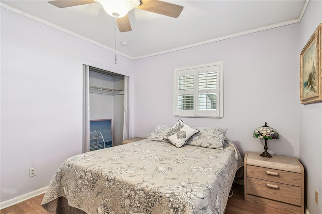 12400 Park Blvd Unit 519, Seminole, FL 33772 - bedroom featuring wood finished floors, crown molding, a closet, and a ceiling fan
