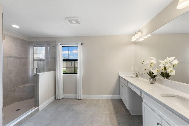 12821 Satin Lily Dr, Riverview, FL 33579 - full bathroom with double vanity, a shower stall, and recessed lighting