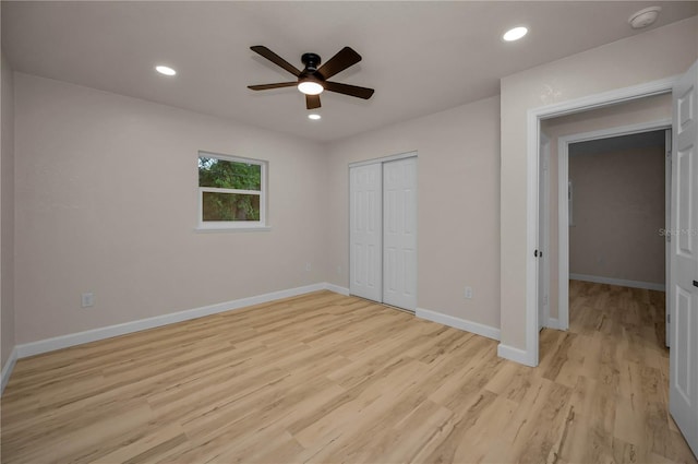 4441 16th St N, Saint Petersburg, FL 33703 - unfurnished bedroom with light wood finished floors, a closet, recessed lighting, and a ceiling fan