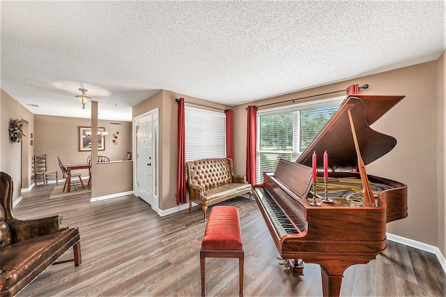 6709 Peachtree Dr, Temple Terrace, FL 33617 - living area with wood finished floors and a textured ceiling
