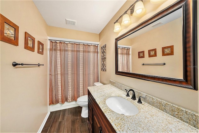 6709 Peachtree Dr, Temple Terrace, FL 33617 - full bath with vanity and wood finished floors