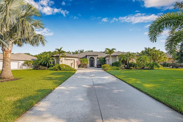 15420 27th Ct E, Parrish, FL 34219 - ranch-style house with driveway, a garage, and a front lawn