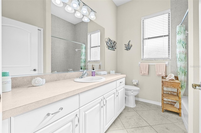15420 27th Ct E, Parrish, FL 34219 - bathroom with vanity, healthy amount of natural light, tile patterned flooring, and shower / tub combo with curtain