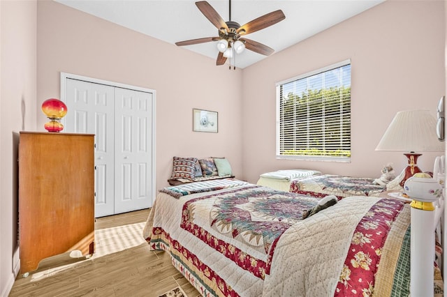 15420 27th Ct E, Parrish, FL 34219 - bedroom featuring wood finished floors, a closet, and ceiling fan