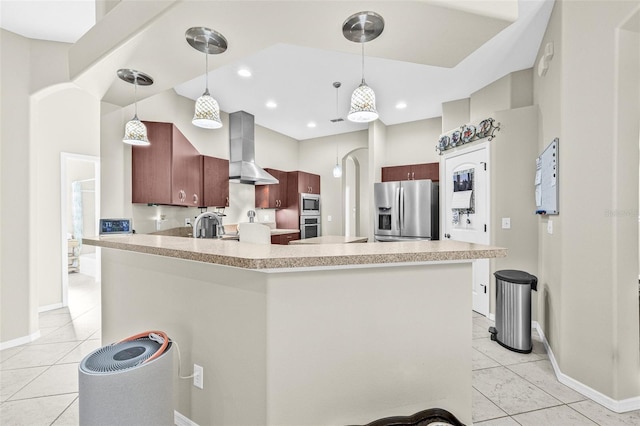 15420 27th Ct E, Parrish, FL 34219 - kitchen with wall chimney range hood, appliances with stainless steel finishes, a peninsula, light countertops, and recessed lighting
