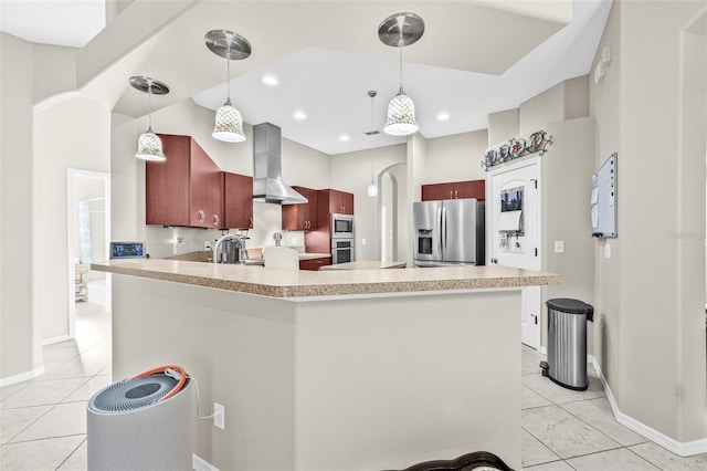 15420 27th Ct E, Parrish, FL 34219 - kitchen with wall chimney range hood, appliances with stainless steel finishes, light tile patterned floors, a peninsula, and recessed lighting