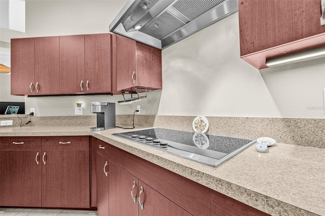15420 27th Ct E, Parrish, FL 34219 - kitchen with ventilation hood, light countertops, and electric stovetop
