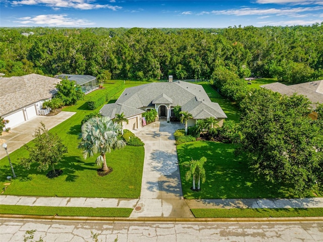 15420 27th Ct E, Parrish, FL 34219 - view from above of property with a heavily wooded area