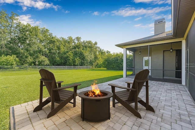 15420 27th Ct E, Parrish, FL 34219 - fenced backyard with an outdoor fire pit and a patio