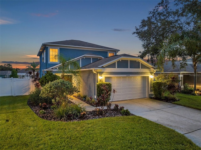 12424 White Bluff Rd, Hudson, FL 34669 - traditional-style house featuring stucco siding, a garage, and concrete driveway