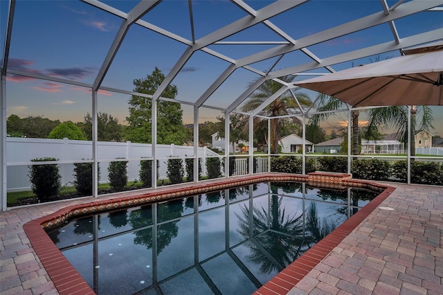 12424 White Bluff Rd, Hudson, FL 34669 - view of swimming pool featuring a patio, a fenced backyard, and a lanai