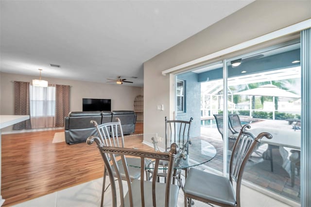 12424 White Bluff Rd, Hudson, FL 34669 - dining space featuring a ceiling fan and light wood-type flooring