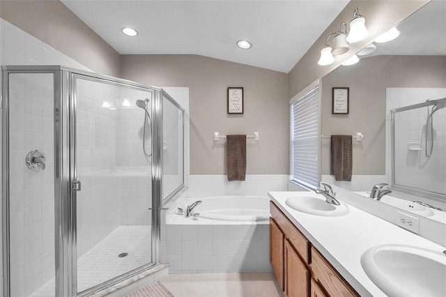 12424 White Bluff Rd, Hudson, FL 34669 - bathroom with a bath, double vanity, lofted ceiling, a shower stall, and recessed lighting