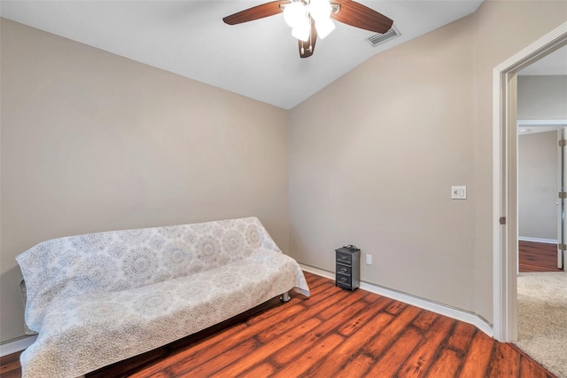 12424 White Bluff Rd, Hudson, FL 34669 - living area with vaulted ceiling, ceiling fan, and wood finished floors