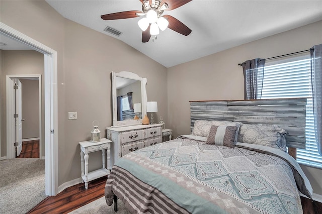 12424 White Bluff Rd, Hudson, FL 34669 - bedroom with vaulted ceiling, dark wood finished floors, and ceiling fan