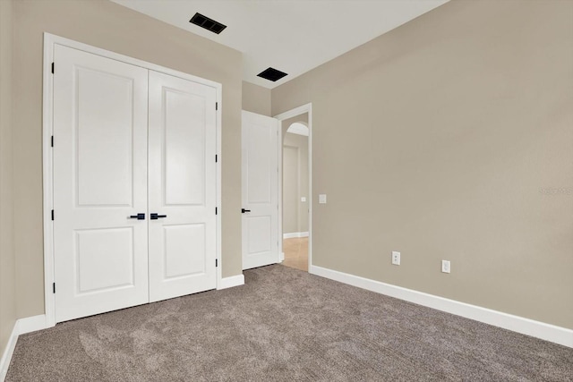 2120 Gwynhurst Blvd, Wesley Chapel, FL 33543 - unfurnished bedroom featuring carpet flooring and a closet