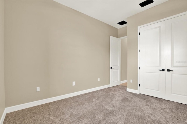 2120 Gwynhurst Blvd, Wesley Chapel, FL 33543 - unfurnished bedroom with carpet floors and a closet