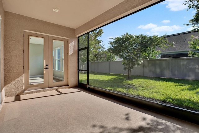 2120 Gwynhurst Blvd, Wesley Chapel, FL 33543 - unfurnished sunroom featuring french doors