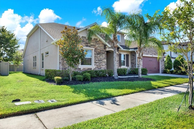 2120 Gwynhurst Blvd, Wesley Chapel, FL 33543 - view of front of property featuring stone siding, stucco siding, a garage, and driveway