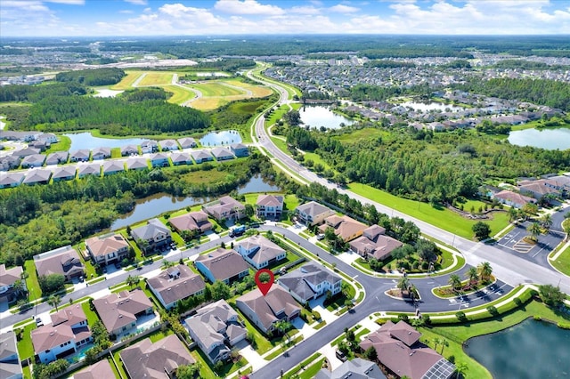 2120 Gwynhurst Blvd, Wesley Chapel, FL 33543 - aerial overview of property's location with nearby suburban area and a nearby body of water