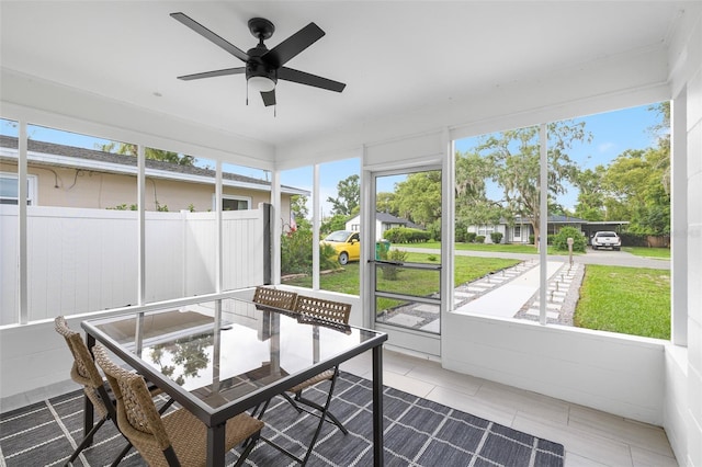 5055 9th St, Zephyrhills, FL 33542 - sunroom / solarium featuring ceiling fan and outdoor dining area