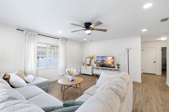 5055 9th St, Zephyrhills, FL 33542 - living room featuring light wood finished floors, recessed lighting, and ceiling fan