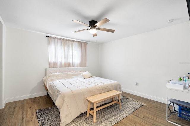 5055 9th St, Zephyrhills, FL 33542 - bedroom featuring wood finished floors and ceiling fan