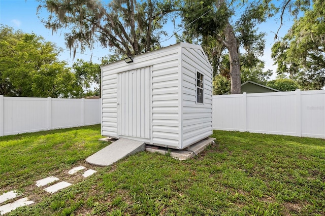 5055 9th St, Zephyrhills, FL 33542 - view of shed featuring a fenced backyard