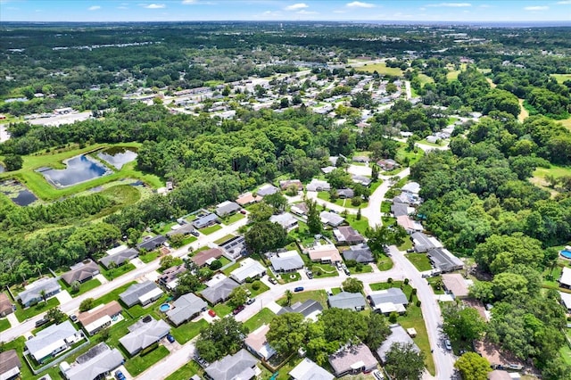 7835 Wallaba Ln, New Port Richey, FL 34653 - aerial view of property's location featuring a nearby body of water