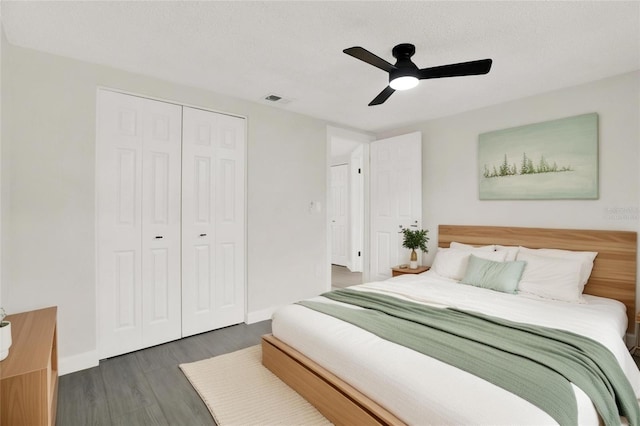 7835 Wallaba Ln, New Port Richey, FL 34653 - bedroom featuring wood finished floors, a closet, and ceiling fan