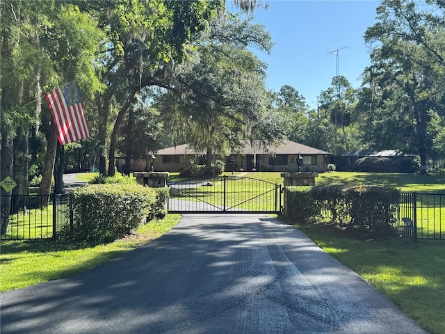 10584 N Dawnflower Pt, Crystal River, FL 34428 - gate featuring view of wooded area