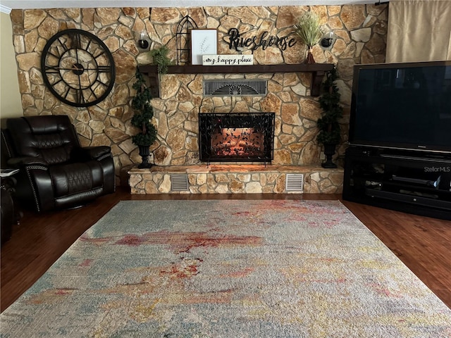 10584 N Dawnflower Pt, Crystal River, FL 34428 - living room with a stone fireplace and wood finished floors